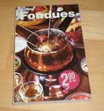 Fondues mit Käse, Fleisch, Gemüse und Schokolade